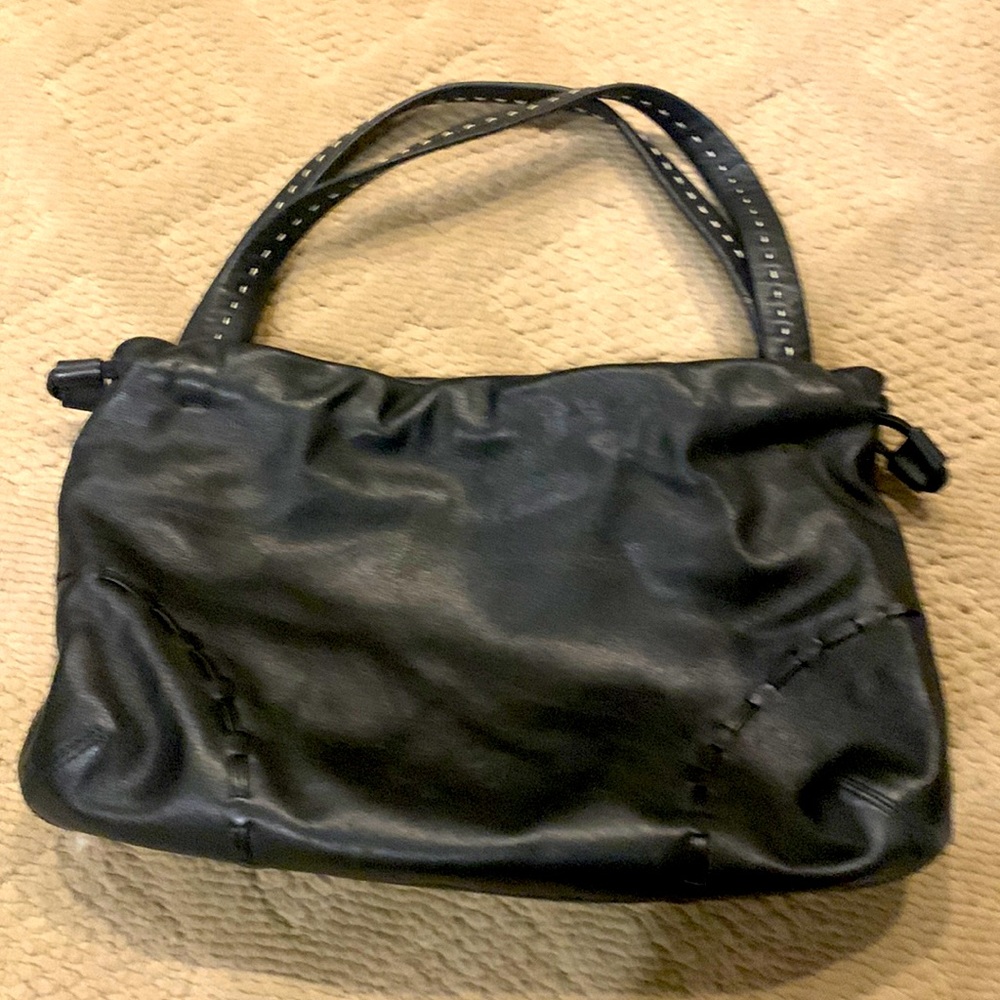 Black leather purse. Not cross body, two handles. Very good condition.
